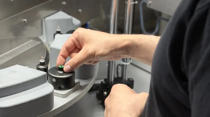 Components of intelligent medical consumables are placed into the rotary table of an assembly demonstrator.